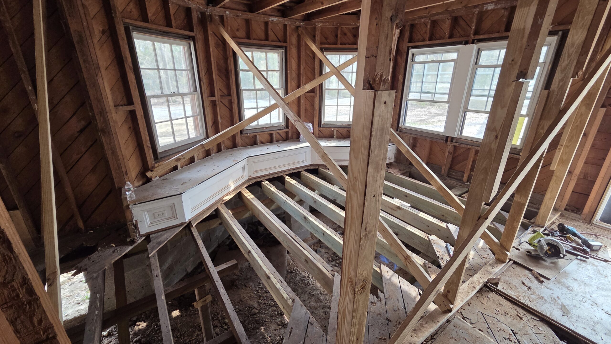 Bruiser's Covington construction 2026 subfloor removal volunteers